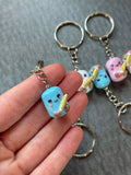 Blue marshmallow holding pencil Jellycat inspired keyring